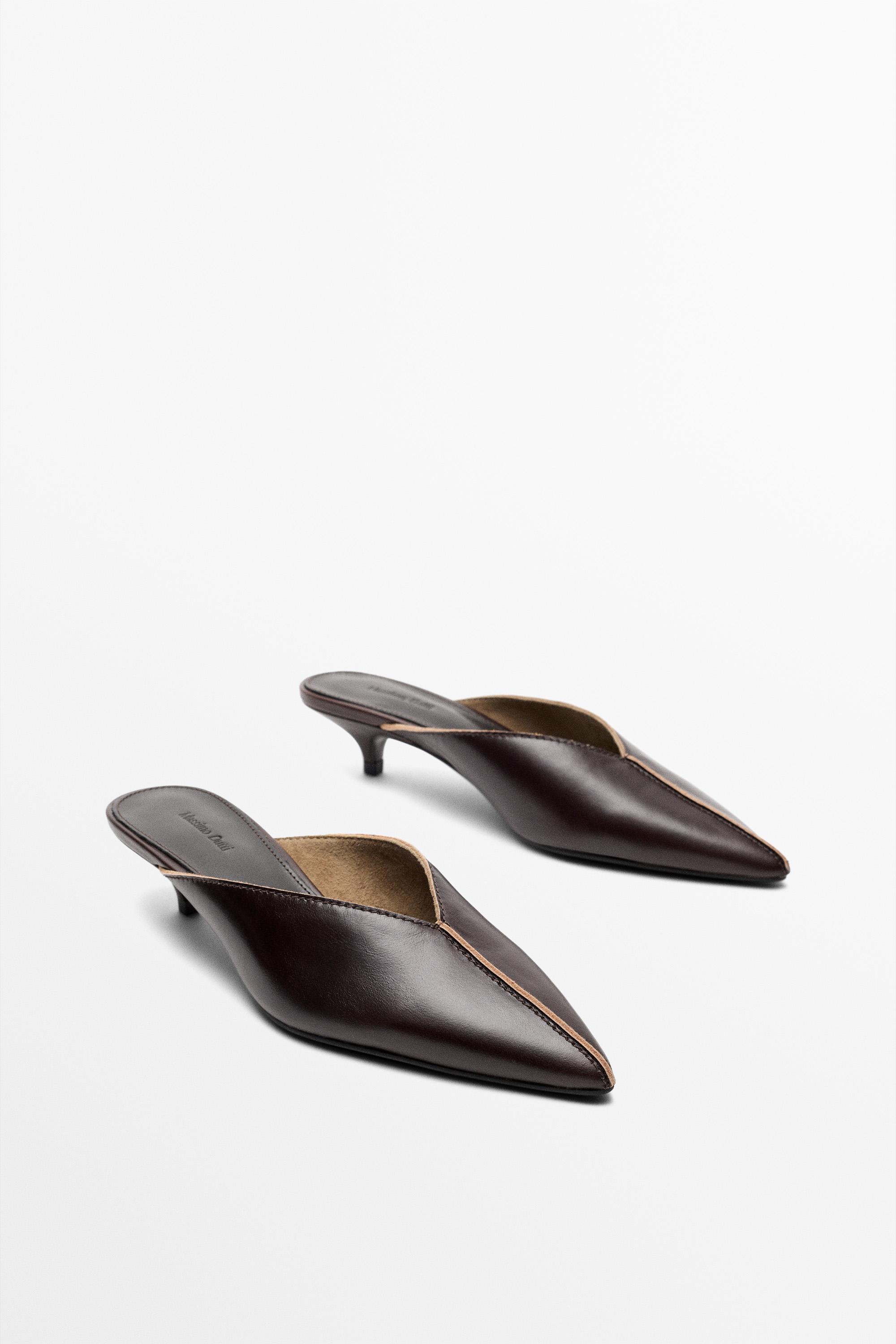 Heeled mule shoe